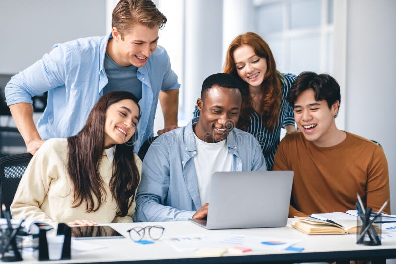 Diverse team collaborating with technology